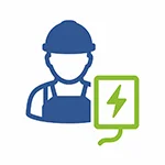 Green and blue icon of a person in hardhat and personal protective equipment behind a device with a lightning bolt on it